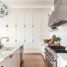 Bright Transitional Kitchen With Floor-to-ceiling White Cabinets 