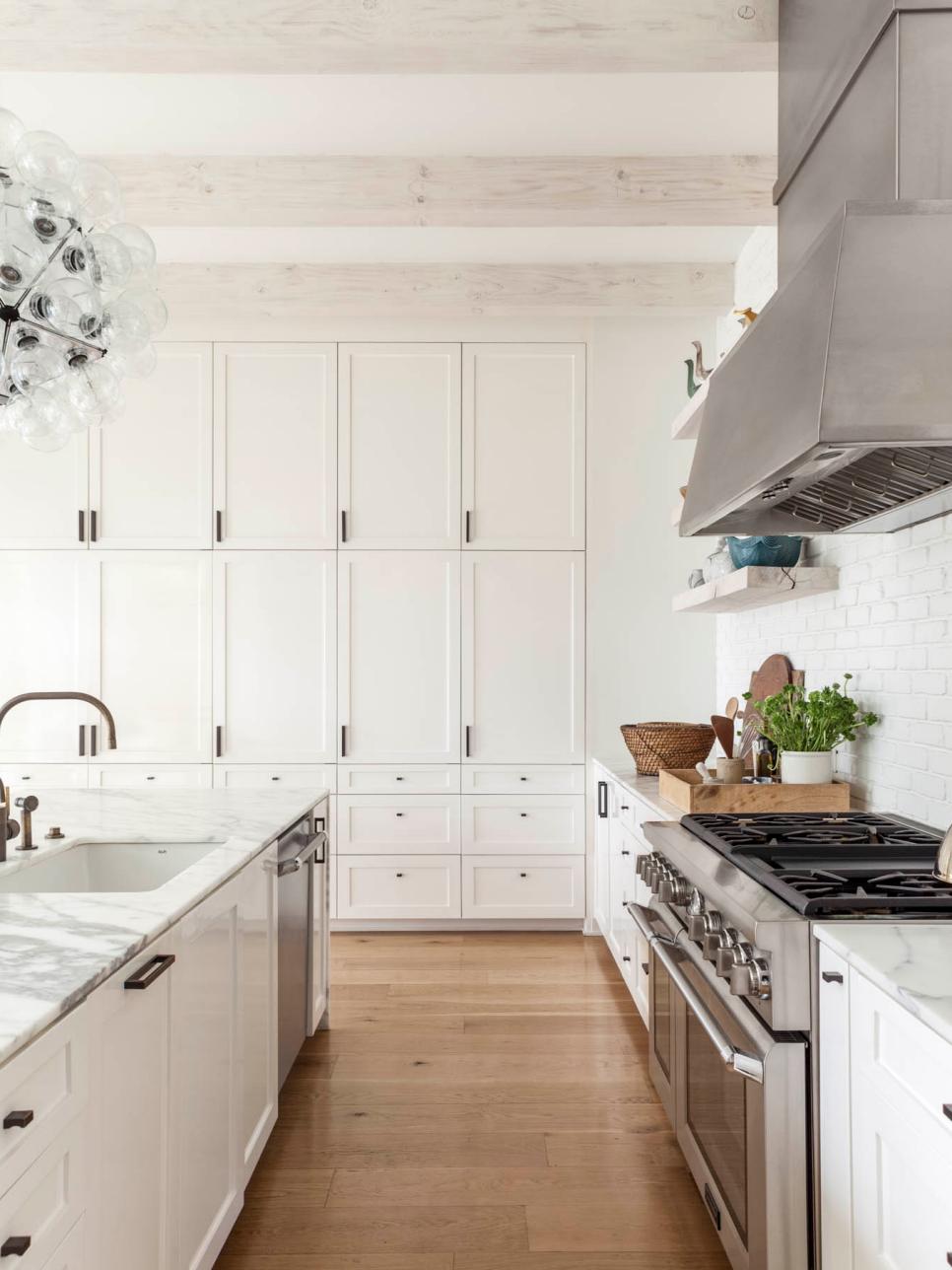 Bright Transitional Kitchen With Floor-to-ceiling White Cabinets | HGTV