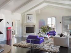 White, Modern Living Room with Purple Velvet Armchairs