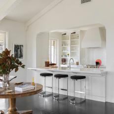 Renovated Kitchen in White-Walled, Eclectic Penthouse
