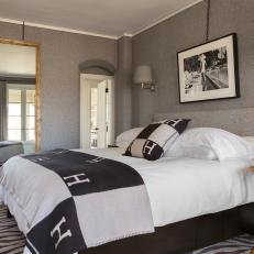 Gray, Eclectic Guest Bedroom with Fabric Walls