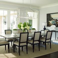 Sophisticated Dining Room With Suede Chairs