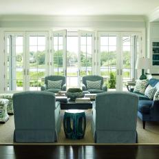 Coastal Living Room With Blue Chairs and Sofa