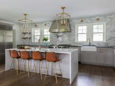 Full-Wall Subway Tile Backsplash in Open Transitional Kitchen With Island Seating