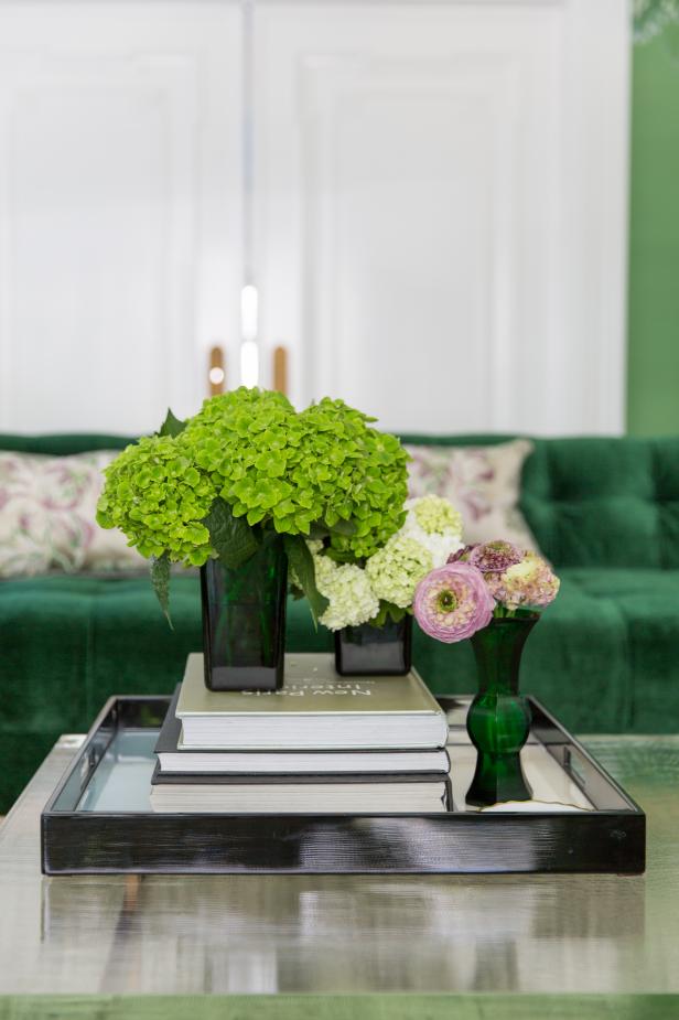 Traditional Coffee Table With Green And Purple Floral Arrangement And