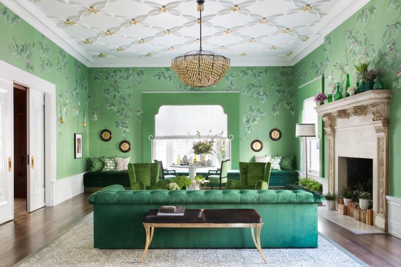 Green And Gold Living Room With Antique Furnishings And Chandelier