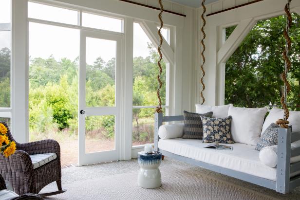 White Cottage Screened Porch With Daybed Porch Swing And Rocking Chair Hgtv