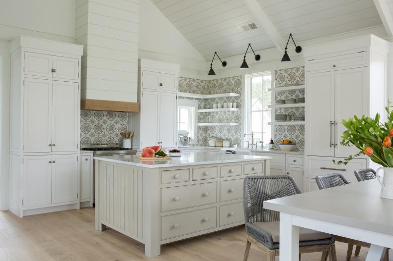 Cottage Kitchen And Dining Room With Open Shelves And Mosaic Tiles