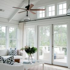 Modern White Cottage Living Room With Modern French Door And White Upholstered Furnishings