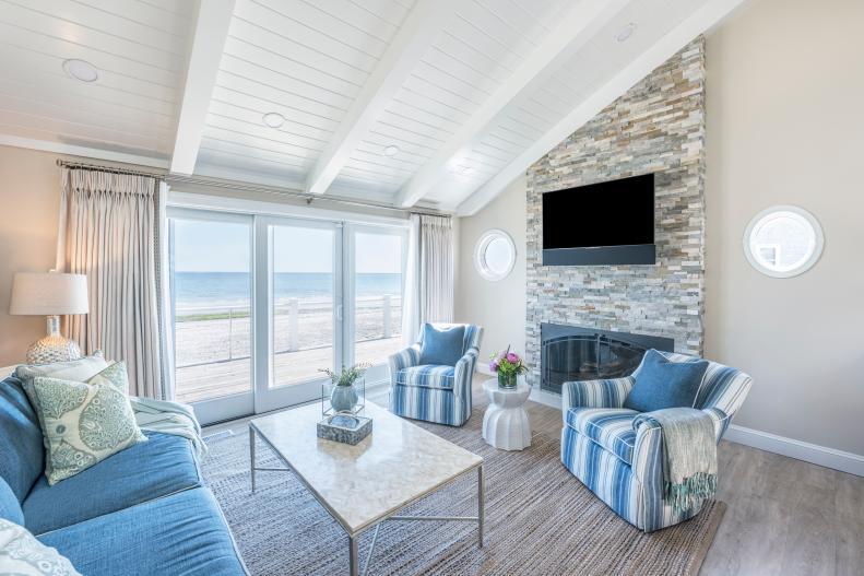 Coastal Living Room With Round Windows