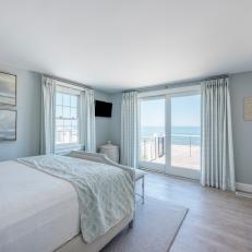 Blue Bedroom With Oceanfront Deck 