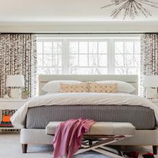 Bright White Master Bedroom With Patterned Curtains
