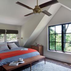 Contemporary Bedroom With Orange Throw