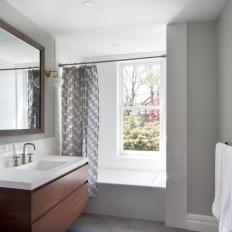 Gray Master Bathroom With Globe Sconces