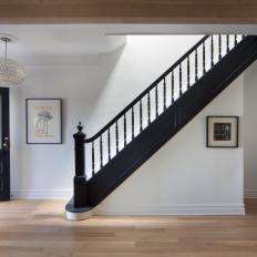 Foyer With Black Staircase