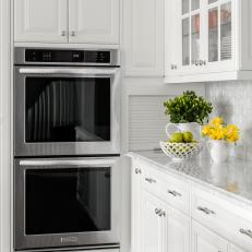 White Chef Kitchen With Double Ovens