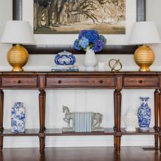 Traditional Console Table With Gold Lamps