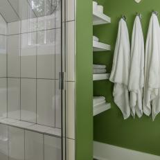 Green Bathroom With Towel Trio