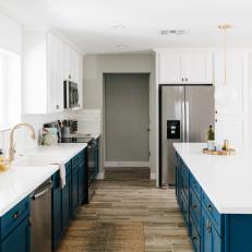 Blue and White Open Plan Kitchen With Blue Island