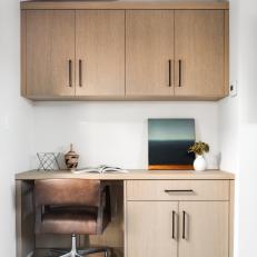 Built-In Desk and Brown Leather Chair