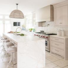White Chef Kitchen With Lucite Barstools