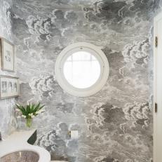 Gray Powder Bathroom With Cloud Wallpaper