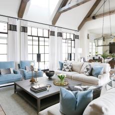Neutral Transitional Great Room With Blue Chairs