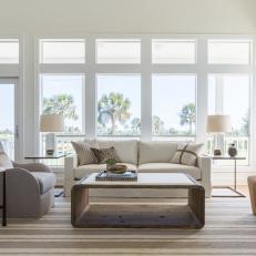 Neutral Coastal Living Room With Brown Stools