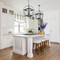 White Cottage Kitchen With Lantern Pendants