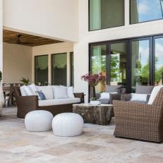 Stone Patio With Brown Wicker Sofas