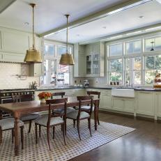 Cottage Eat-In Kitchen With Brass Pendants