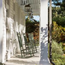 Porch With Green Rocking Chairs