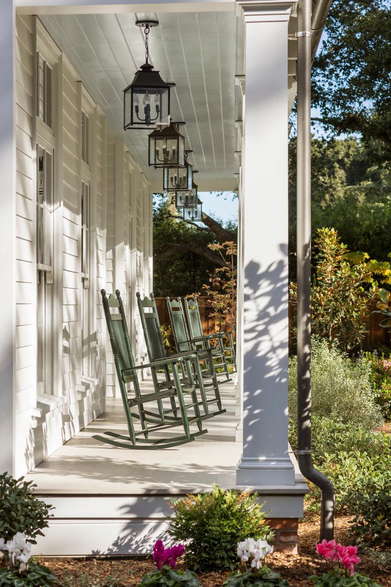 Porch With Green Rocking Chairs