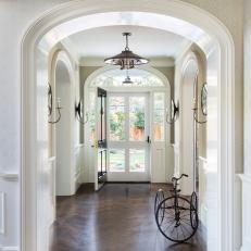 Farmhouse Foyer With Antique Bicycle