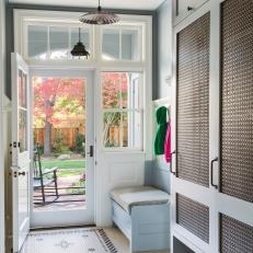 Blue Cottage Mudroom With Mosaic Tile Floor