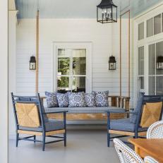 Country Porch With Blue Swing