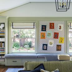 Green and Blue Cottage Playroom With Window Seat