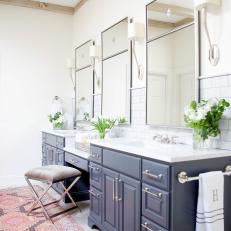 Dual Sink Master Bathroom Vanity In Blue With White Marble Countertops And Subway Tile Backsplash