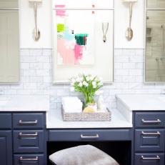 Contemporary Master Bathroom Retreat With Modern Sconces And Vanity Stool And Marble Wall Tile