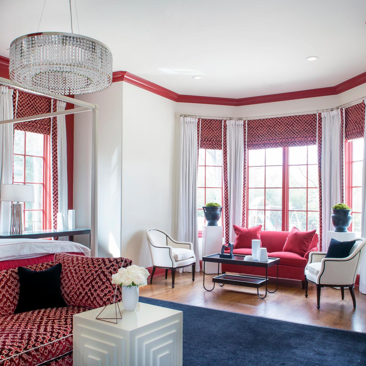 Master Bedroom Seating Area With Pink Accent Wall And Trim