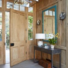 Country Wood-Paneled Foyer and Blue Mirror