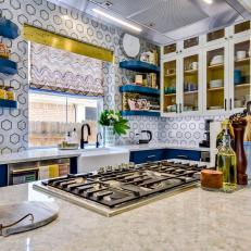 Modern Kitchen With Black And White Wall Tile And Blue Cabinets And Shelves