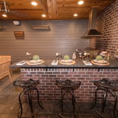 Outdoor Dining Room And Bar With Exposed Brick And Exposed Beams
