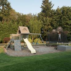 Outdoor Family Play Area With Swing Set And Trampoline
