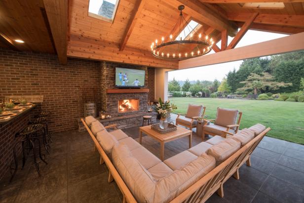 Covered Patio Outdoor Living Room With Upholstered Seating And