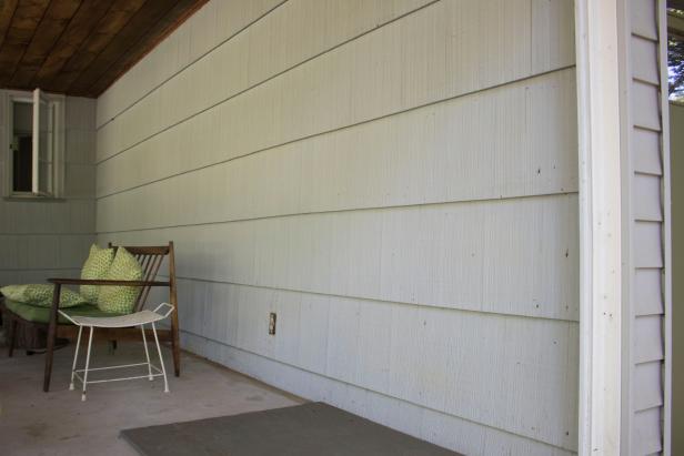 Removed vinyl siding to reveal cedar shingles.