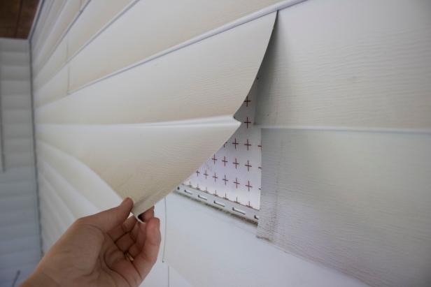 How to see what's installed beneath vinyl siding.