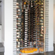 Contemporary Wine Cellar With Copper Details
