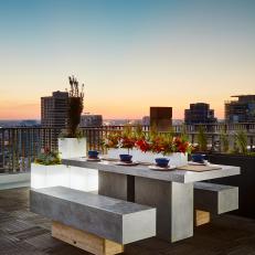 Rooftop Dining Area With Skyscraper View