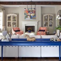 Traditional Family Room With Blue Table